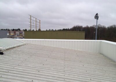 création d'un chéneau suite à réhausse charpente sur un show room