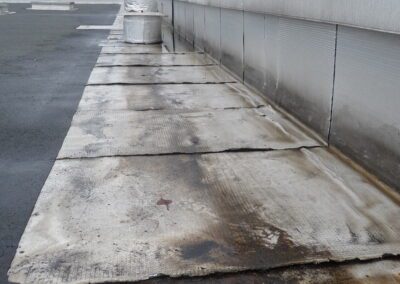 travaux de reprise des étanchéités de chéneaux sur magasin